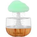 White cloud-shaped humidifier with LED night light and USB cable