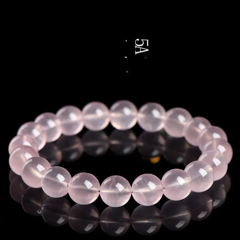 Natural polished crystal round bead bracelet in pink, shown in a single circle configuration with various bead size options.