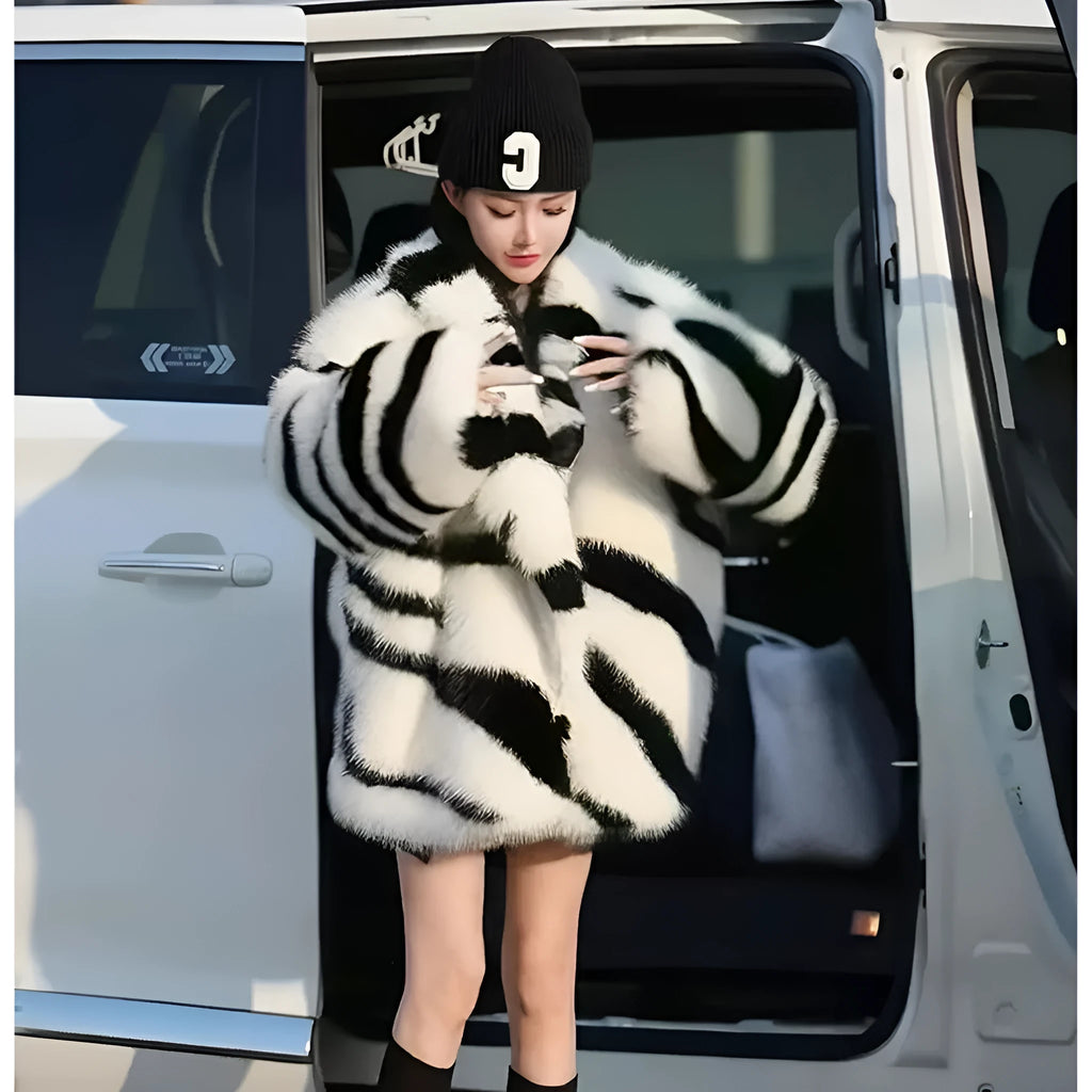 Women's zebra stripe fur top with skimmer collar and long sleeves