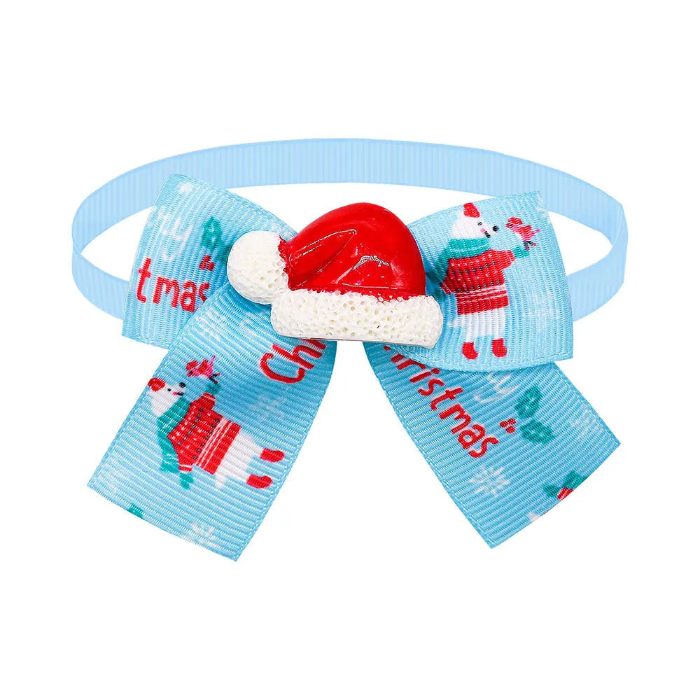 Red and green Christmas pet bow tie accessory for dogs or cats with British style design