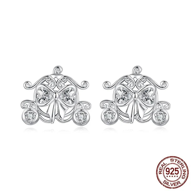 Pair of 925 silver retro pumpkin car stud earrings with romantic French design against a neutral background