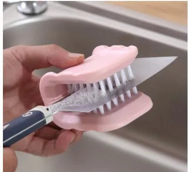 Blue U-shaped plastic brush for cleaning kitchen knives and forks.