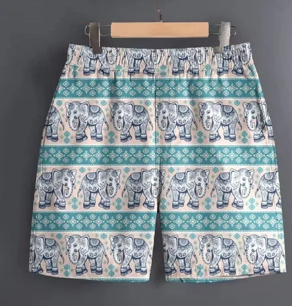Men's casual polyester shorts in a camouflage pattern, featuring an elastic waistband.