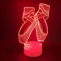 3D ballet dancer LED night light with remote control showing multiple colour options on acrylic panel.