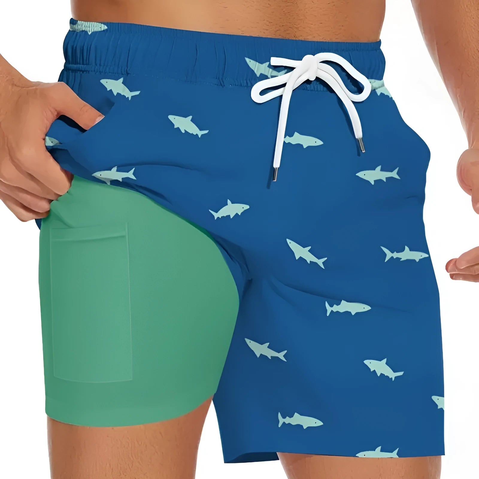 Men's black shark figure beach shorts with drawstring waist, laid flat showing straight leg cut.