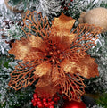 16cm diameter Christmas tree wreath with glitter powder finish in gold colour on a tabletop