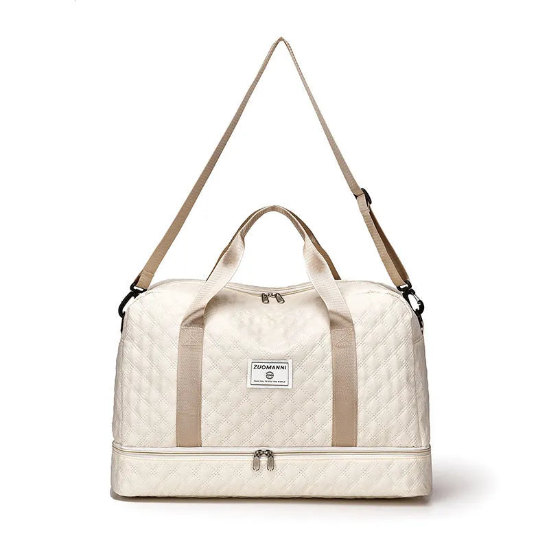 Large solid-colour Oxford cloth travel bag with a 36-55 litre capacity for buggies.