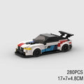 BMW M8 GTE building block car model kit assembled on a flat surface, showing 17cm length and plastic construction