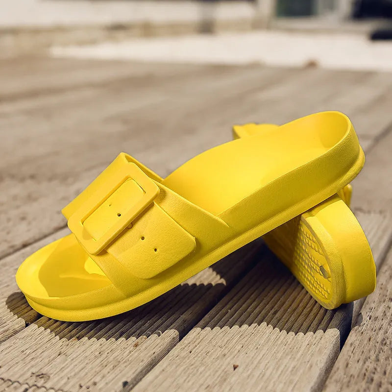 Women's grey blue buckle strap sandals with a soft EVA sole on a light background.