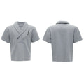 Men's dark grey cotton sports suit with V-neck short sleeve top, padded shoulders, metal embellishments, and matching shorts.