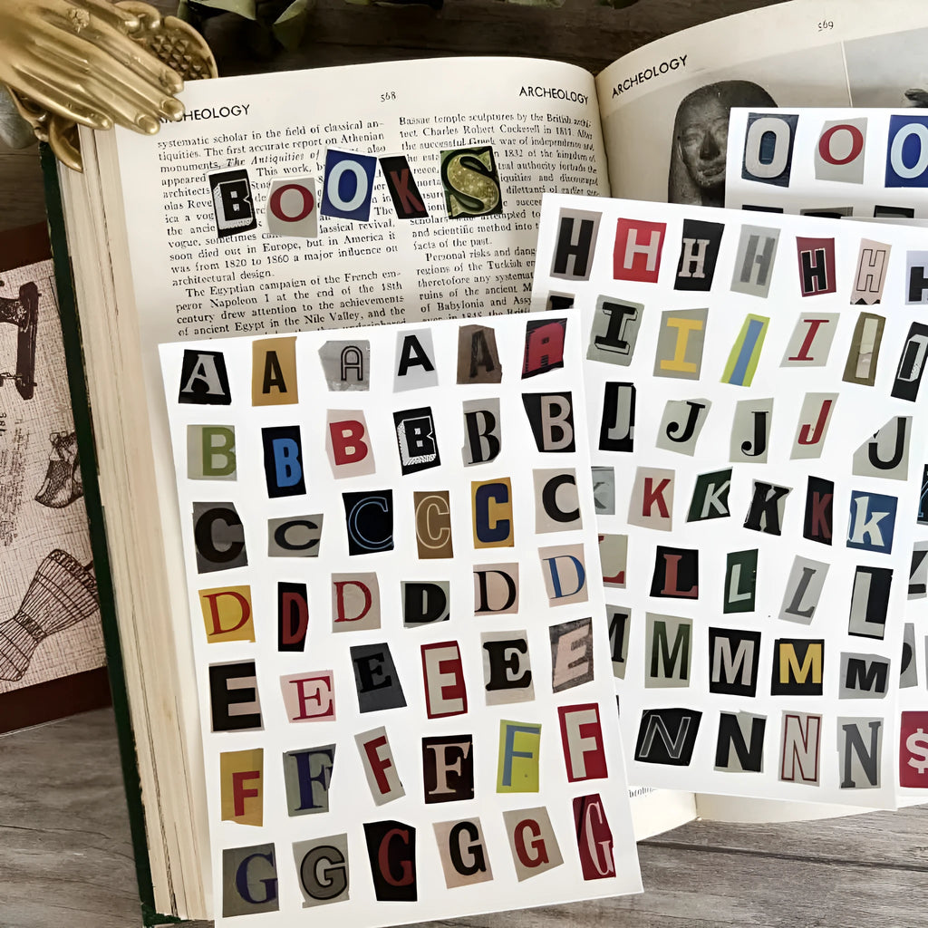 Set of cute style printed decoration stickers showing English letters, numbers, symbols, and weekly words.