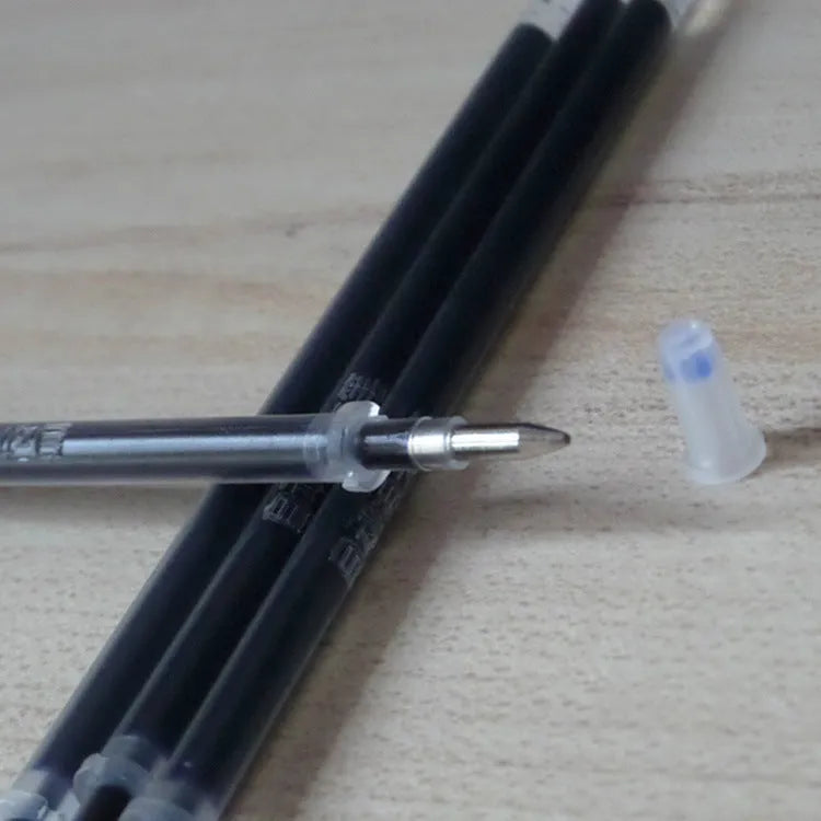 Automatic fade pen set showing pen holder, case, and eight refill units for temporary marking.