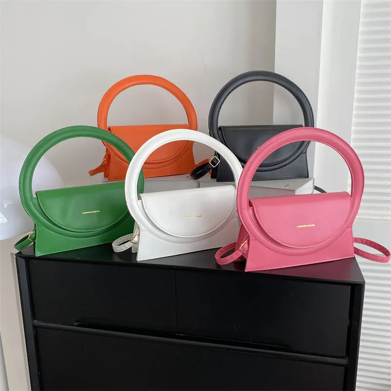 PU leather messenger bag with sandwich pocket design and stitching detail