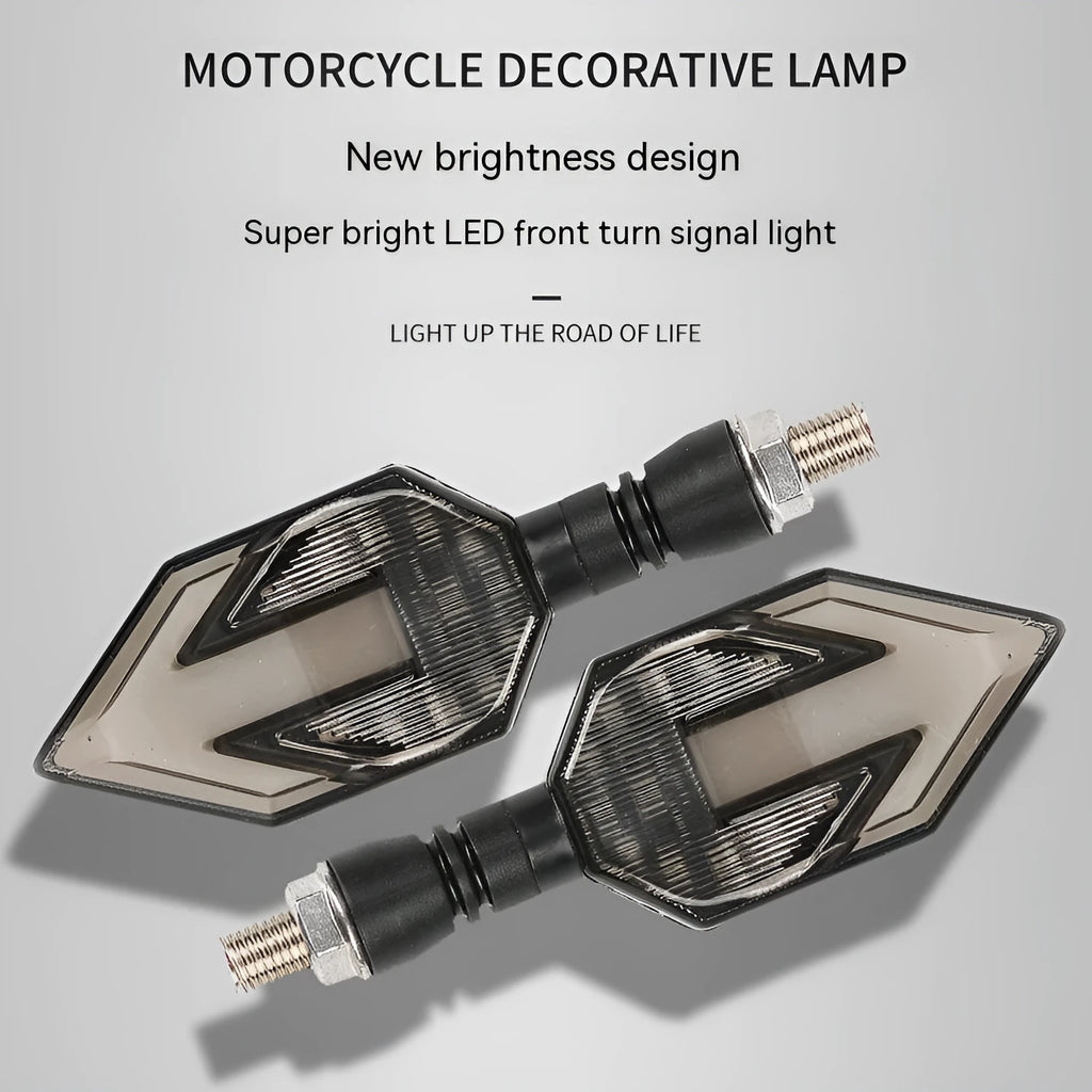 Arrow-shaped 12V LED motorcycle turn signal light in yellow with choice of blue, red, or white accent.