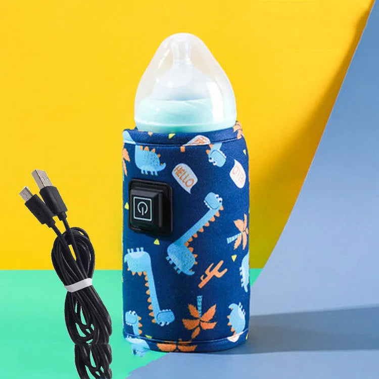 USB baby bottle warmer in a blue dinosaur patterned composite velvet insulating cover.
