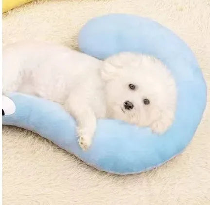 Blue U-shaped cat pillow in a question mark style on a white background