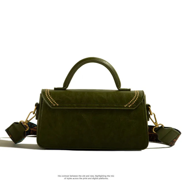 Women's textured PU messenger bag in square vertical shape with sandwich pocket and sewing thread detailing