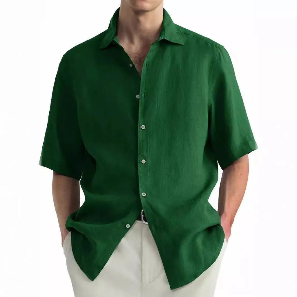 Men's green washed cotton casual shirt in a regular fit cardigan style on a hanger.
