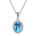 925 sterling silver four-piece jewellery set with blue topaz gems showing geometric-designed earrings, ring, pendant, and necklace