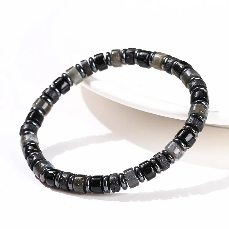 Unisex haematite bracelet with 6mm geometric spacer beads and blue pine lapis lazuli interval stones.