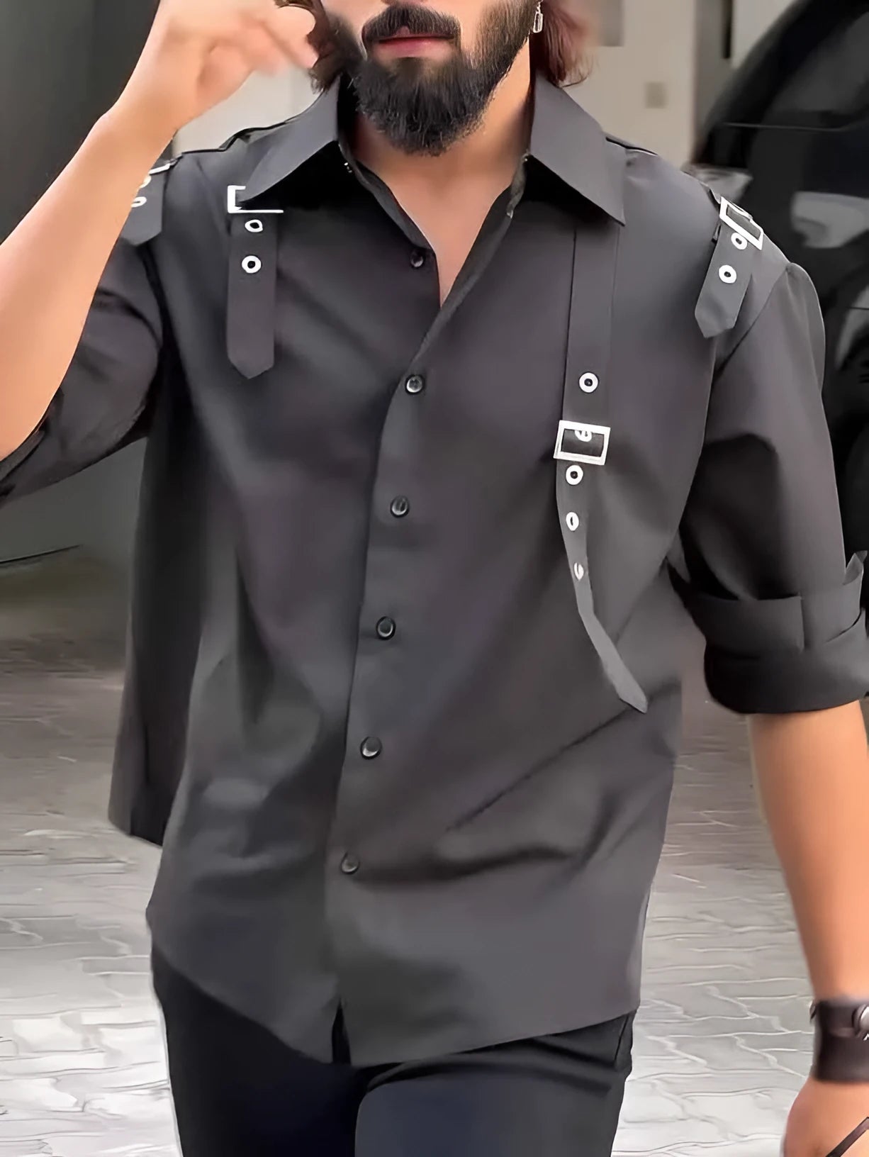 Men's black long-sleeve button-up shirt with a regular fit on a hanger.
