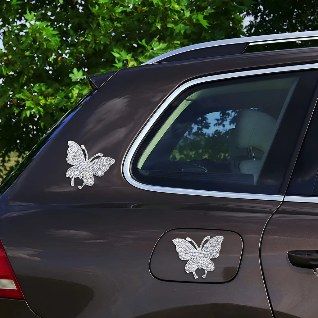 Diamond-encrusted glass car sticker with butterfly and bear claw design for vehicle decoration.