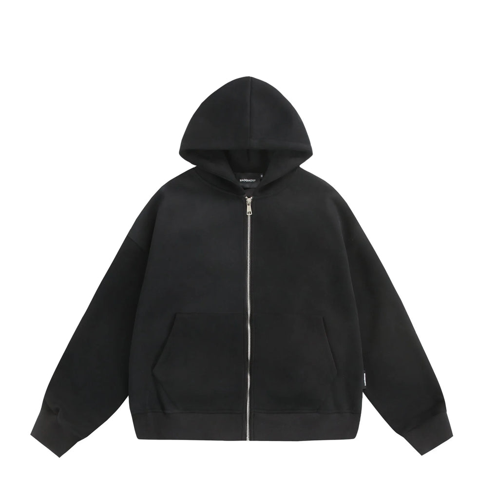 Loose fit solid colour cardigan coat featuring a small bag design on the back.