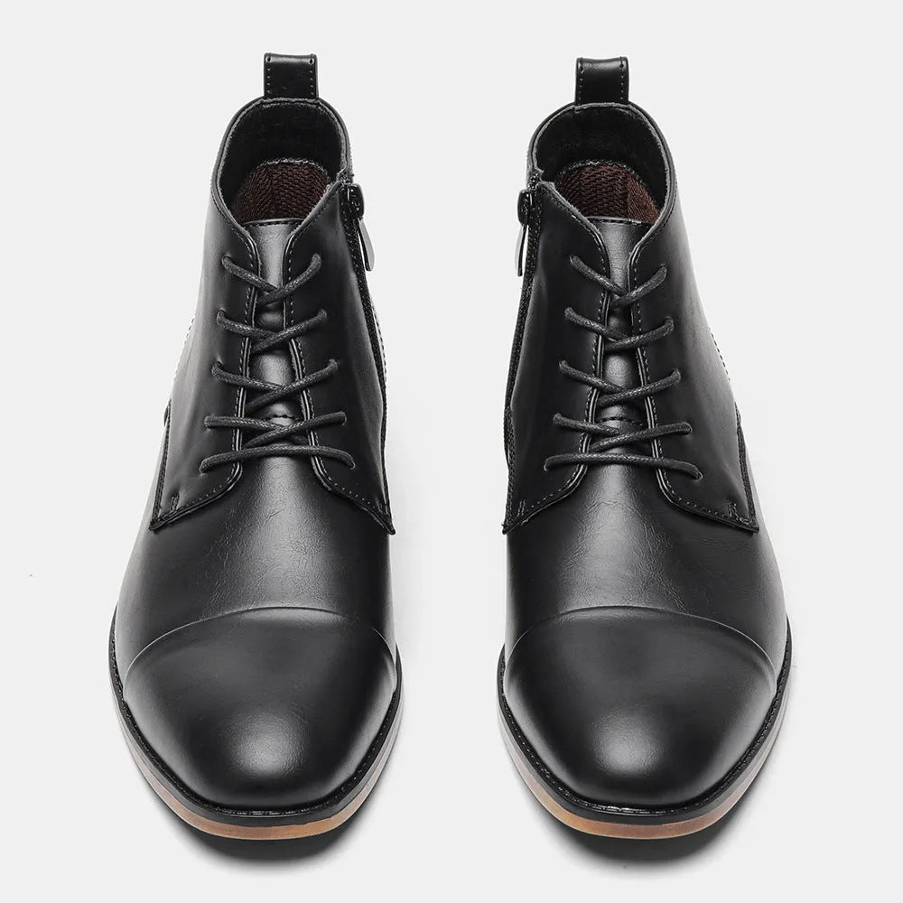Men's brown side-zip Chelsea boot with round toe and low wooden sole on a white background.