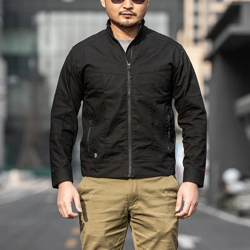 Men's tactical coat in polyester with a camouflage pocket, shown in a camouflage colour option.
