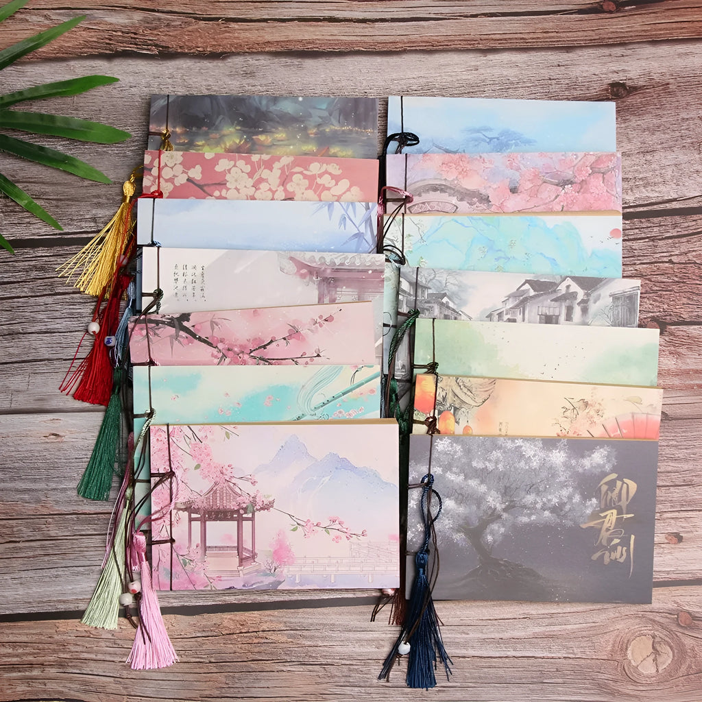 Kraft paper notebook with decorative tassel and hand-stitched spine.