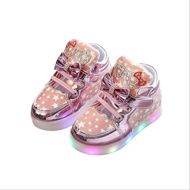 Children's LED trainers with magic button and illuminated soles in golden, pink or silvery colours
