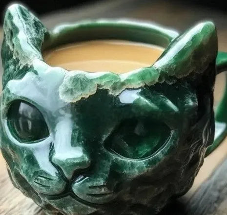 Colourful handmade geode resin mug with a cat-shaped handle in purple, blue, green, or pink.