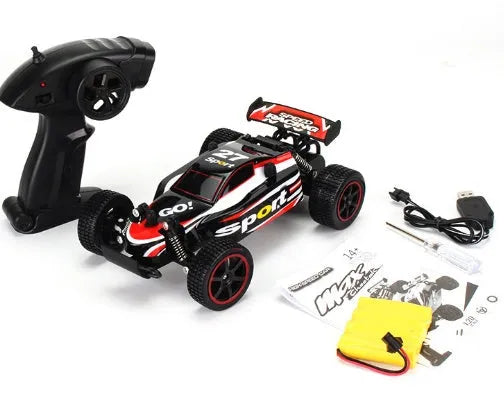Blue 1:18 scale remote control drift car with 2.4GHz transmitter on a hard surface