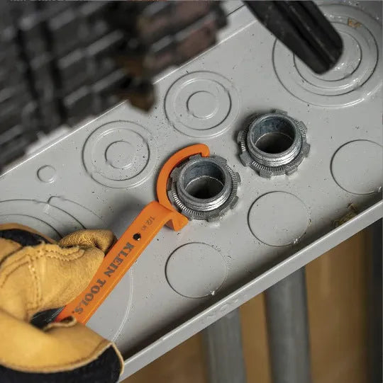 Orange, grey, and black magnetic suction wrenches laid out to show crescent, catheter locking, and standard spanner types.