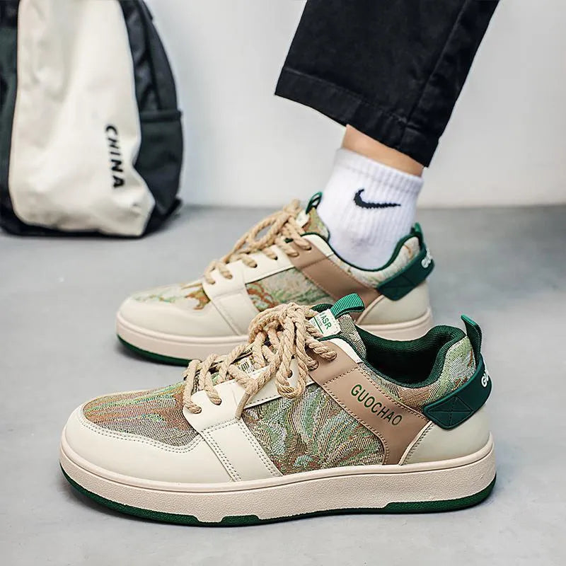 Men's low top lace-up sneakers with oil painting colour block pattern, PU upper, rubber sole, flat heel