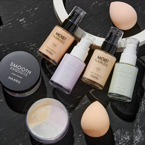 4-piece makeup set with liquid foundation isolation milk loose powder and beauty egg in ivory and green natural and purple colours