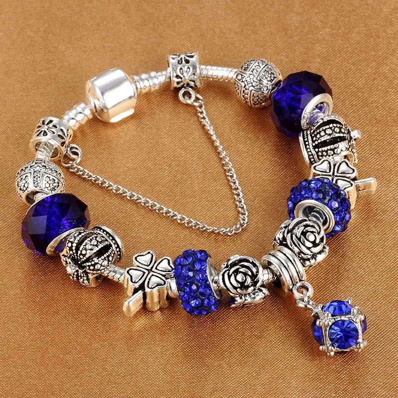 Multicolour beaded bracelet with alloy, glazed, and diamond beads on a white background