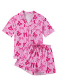 Pink women's bow print pajama set with top and trousers