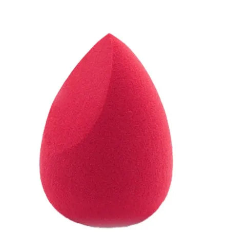 Set of seven differently shaped makeup sponges in various colours on pink background