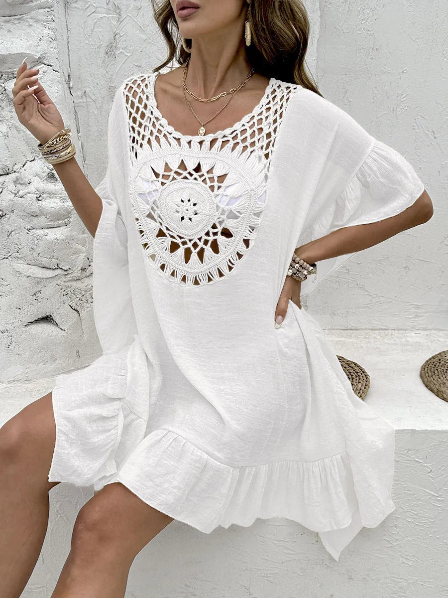 Apricot coloured beach dress with crochet stitching and tassel trim on patchwork skirt