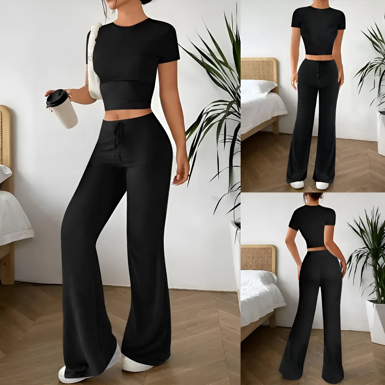 Black high-waist trousers and matching short-sleeve t-shirt set on a hanger.