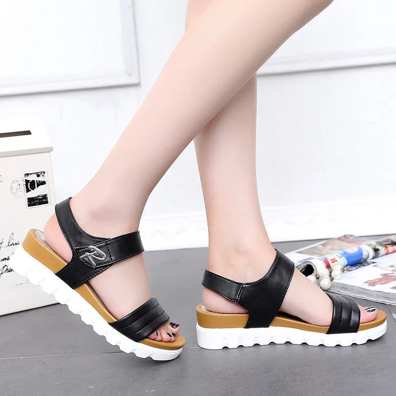 Women's white fish mouth wedge heel sandals with ankle strap on beach