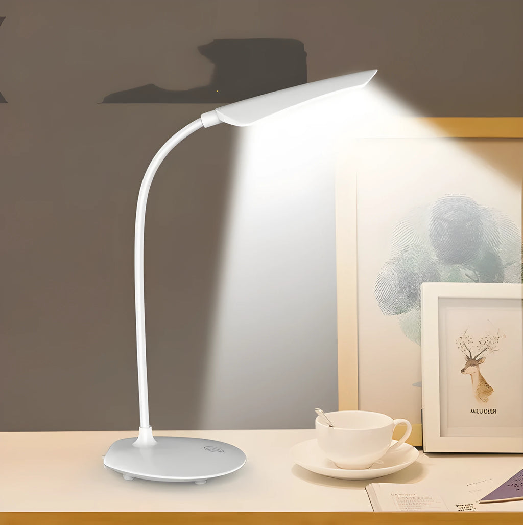 White LED desk lamp with USB charging cable, touch switch, and ABS shade on a desk