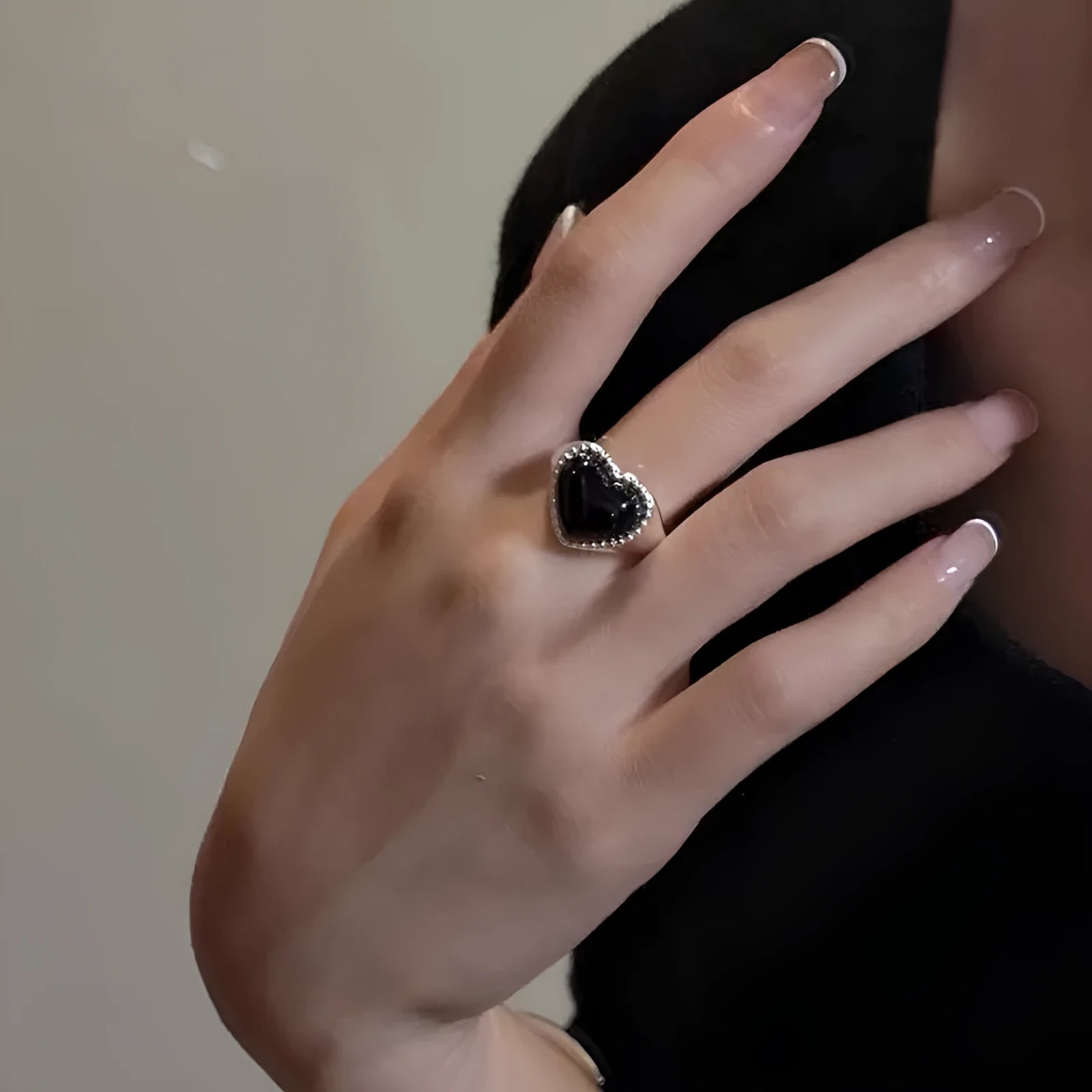 Adjustable open mouth ring with black agate stone and heart design in sterling silver