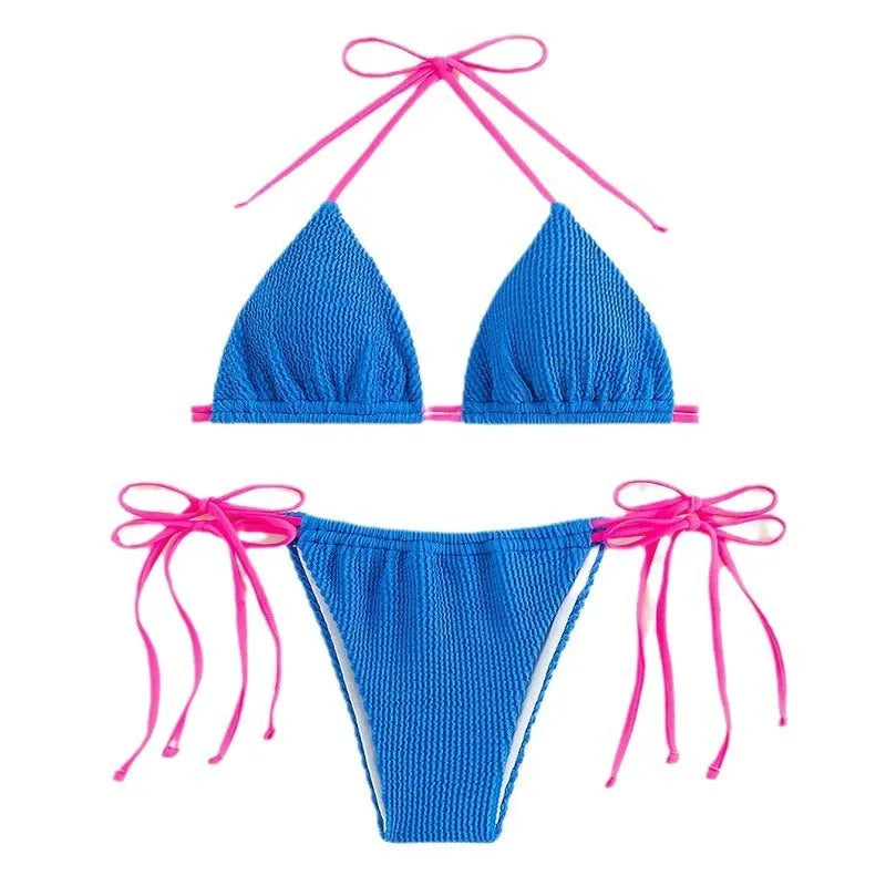 Women's black lace up bikini swimsuit set on a mannequin.