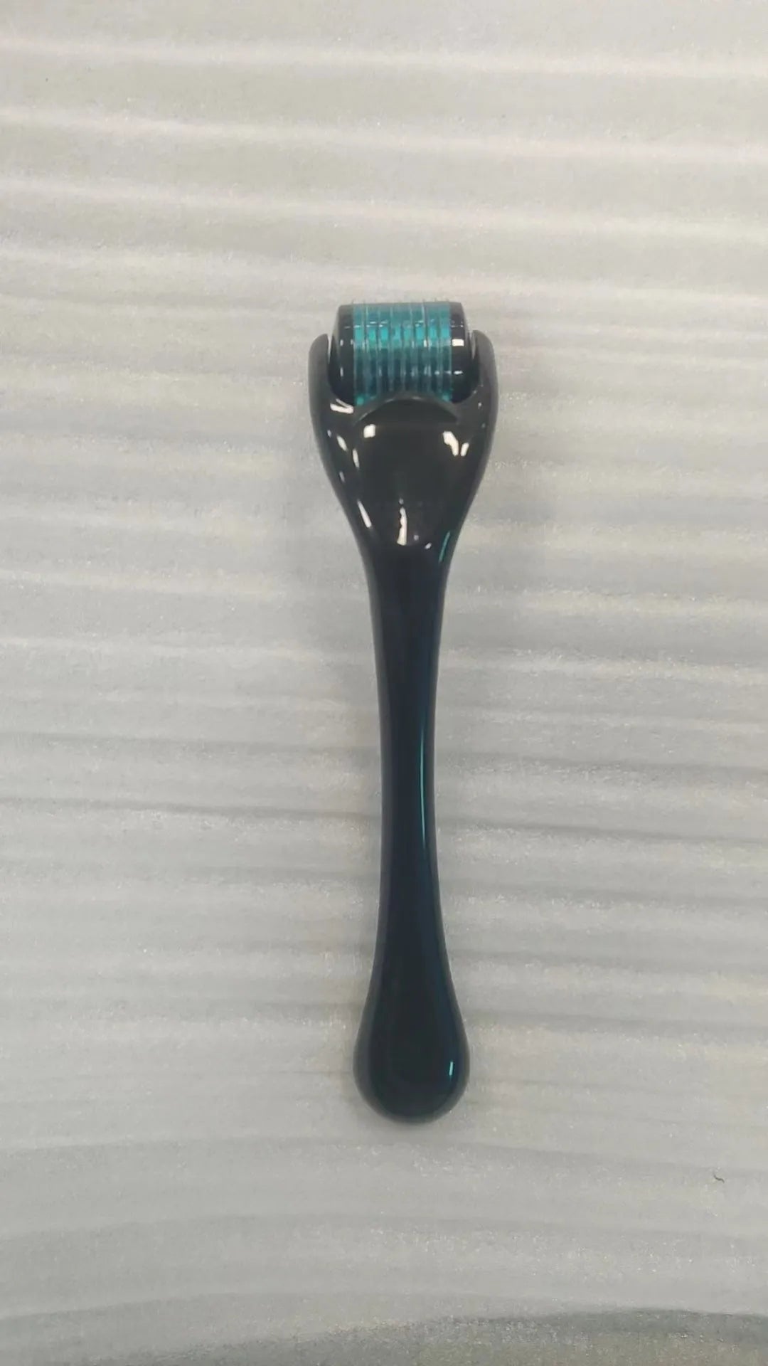 540 micro needle mechanical derma roller with black handle and coloured wheel options