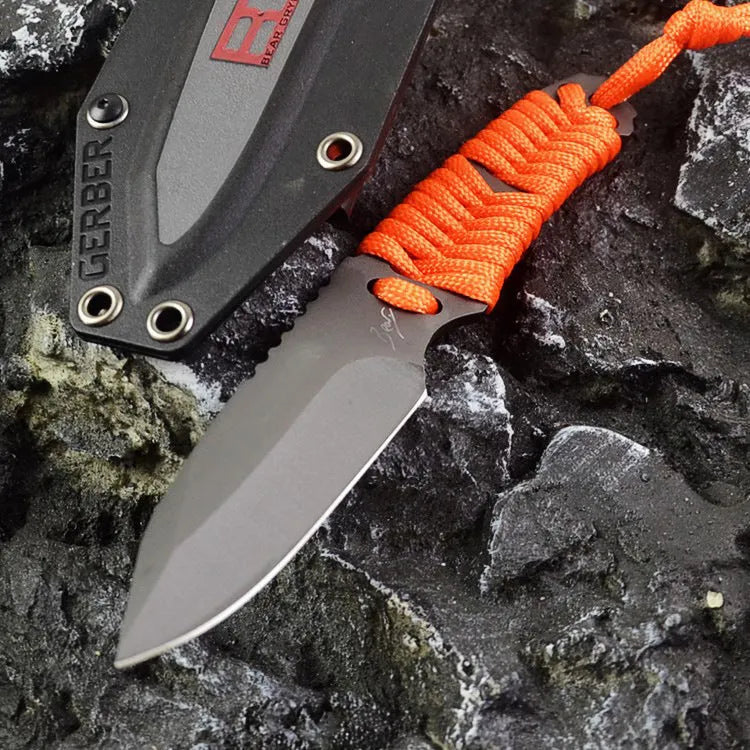 Camping survival knife with rope-wrapped handle and ABS sheath showing blade and full length