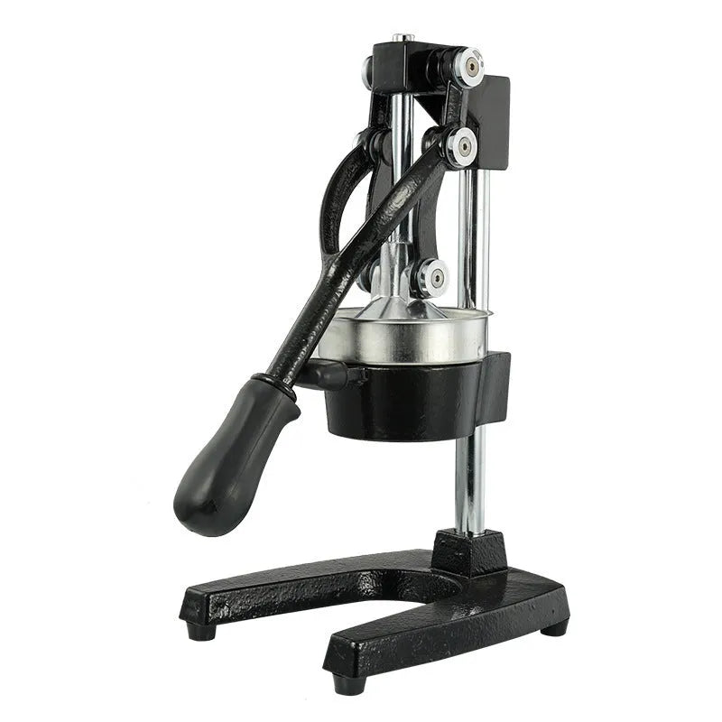Black cast iron manual citrus juicer with stainless steel cone on a white background