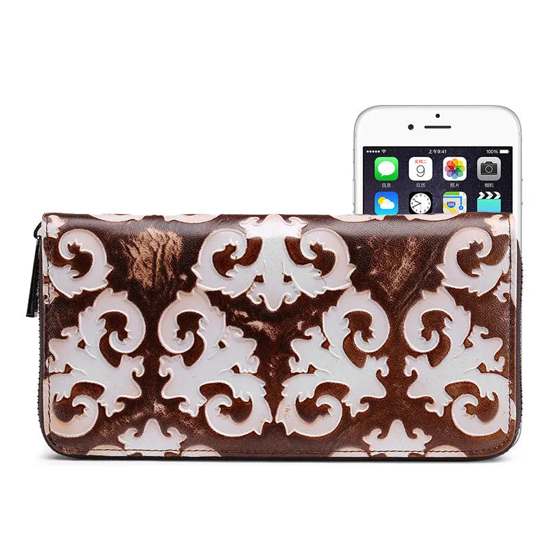 Brushed genuine leather women's retro wallet in brown white with embossed floral pattern and horizontal square shape.