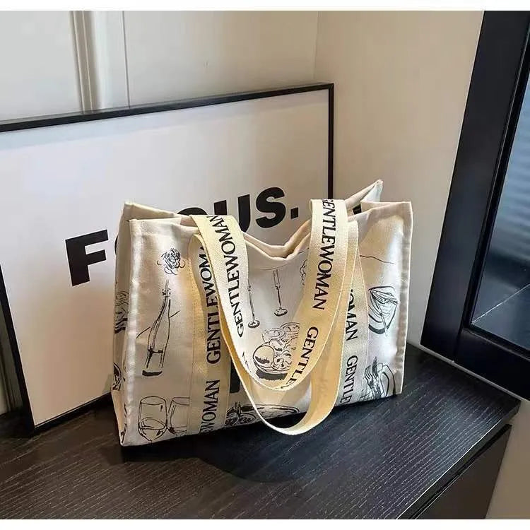 Canvas shoulder tote bag with printed design, large capacity for shopping and travel